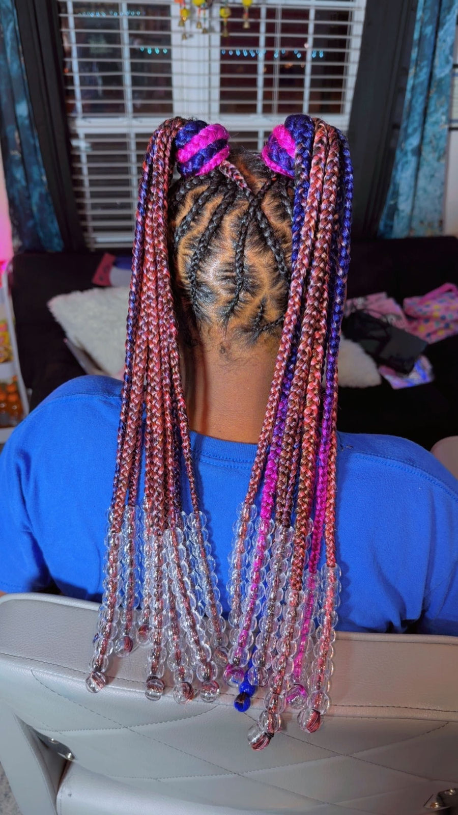 Kids double braided ponytails with colorful beads and bright braid accents, hairstylist in Texas City, TX
