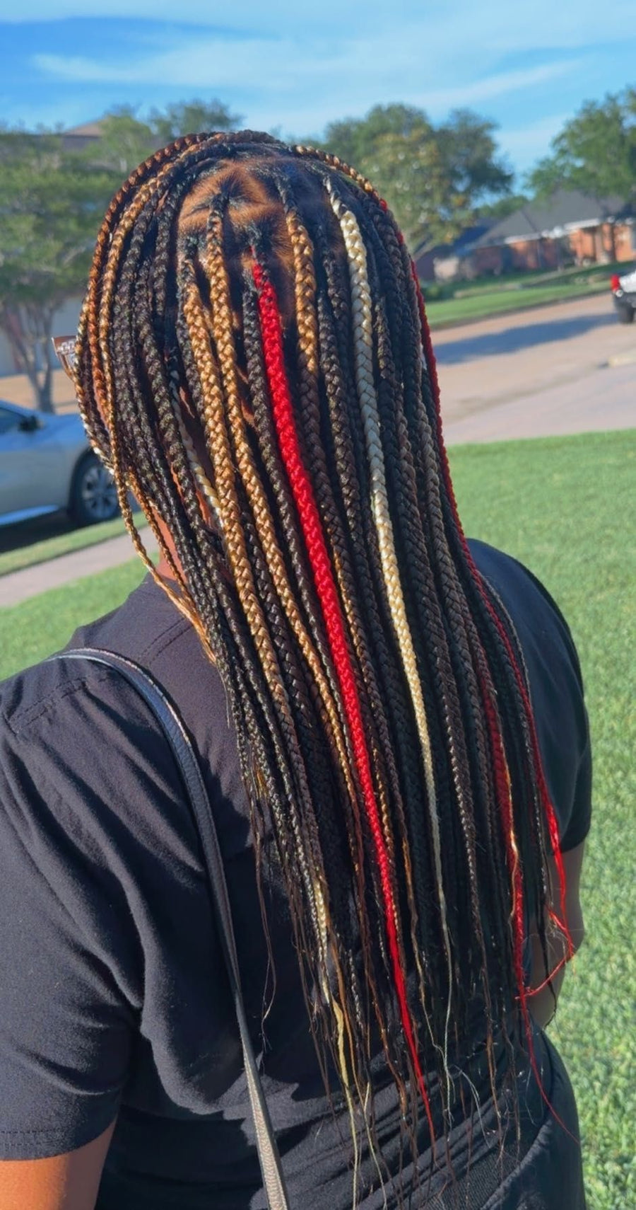 Long mixed color box braids with red and blonde highlight accents, hairstylist in Texas City, TX