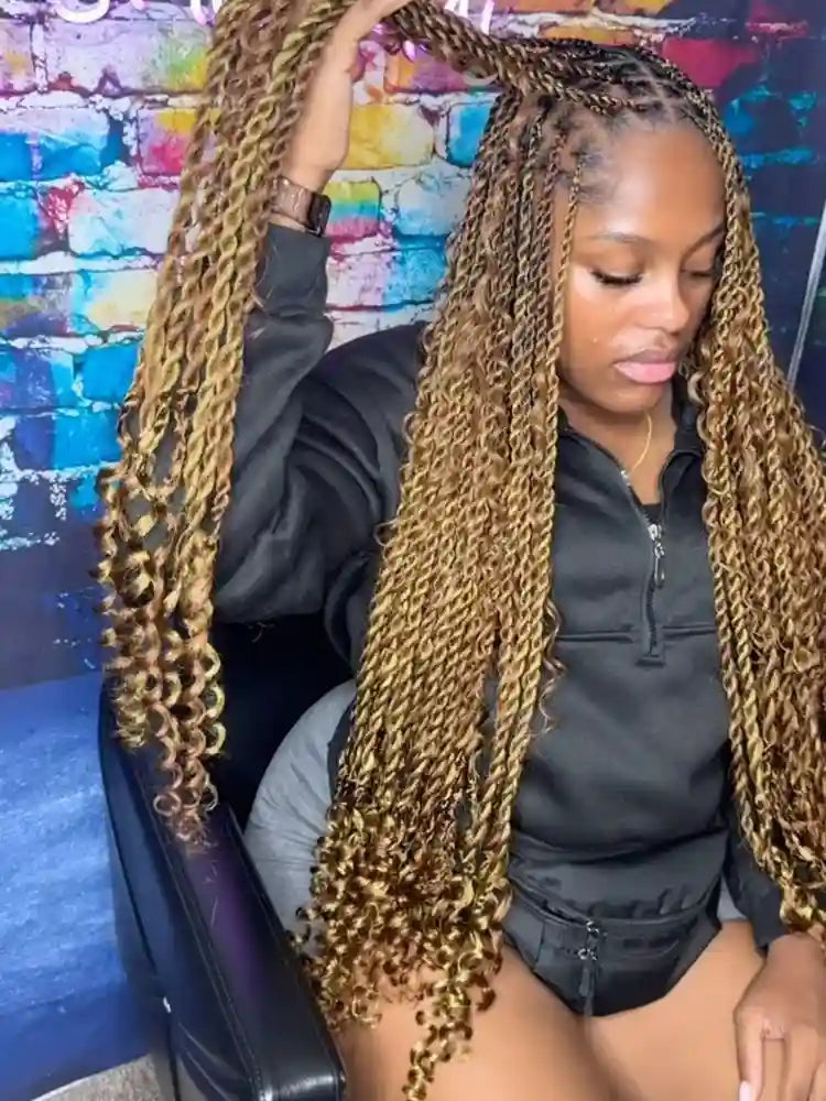 Long blonde passion twists with curly ends, hairstylist in Norfolk, VA